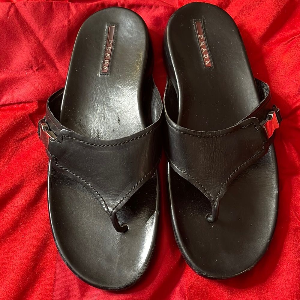 Authentic Prada sandals very good shape lots of walk left.